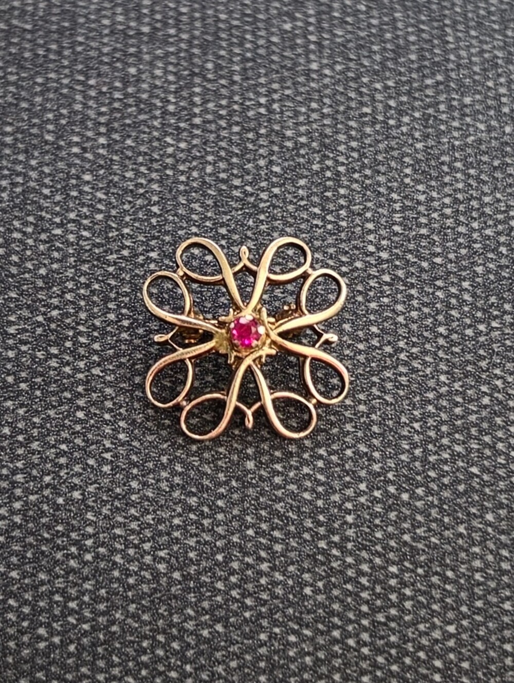 Gold Floral Filigree Brooch with Pink Stone